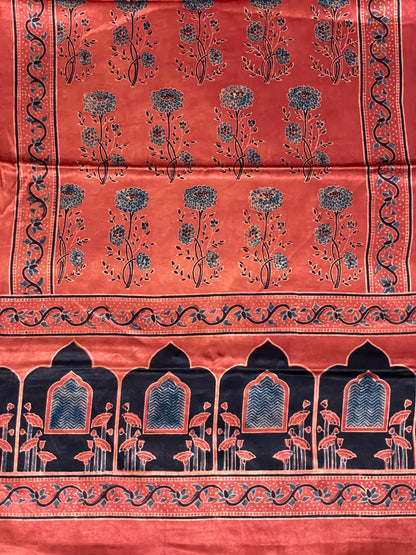 Handcrafted terracotta red Ajrakh stole made from premium Mashru silk fabric