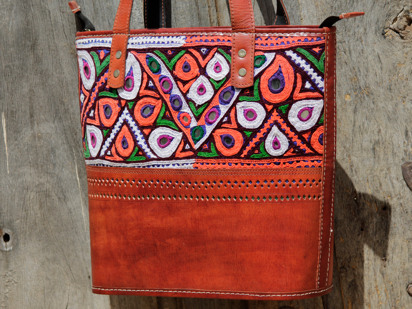Brown leather bag featuring authentic Kutchi embroidery on premium handcrafted leather