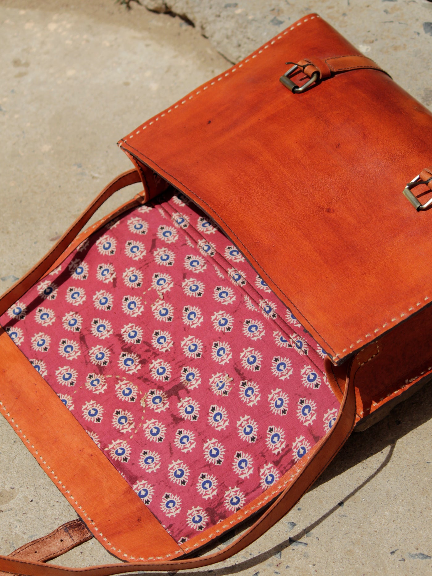 Professional brown leather office bag designed for carrying documents and work essentials