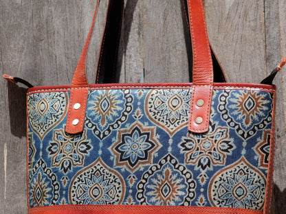 Mashru silk leather bag crafted with premium leather and traditional woven silk detailing
