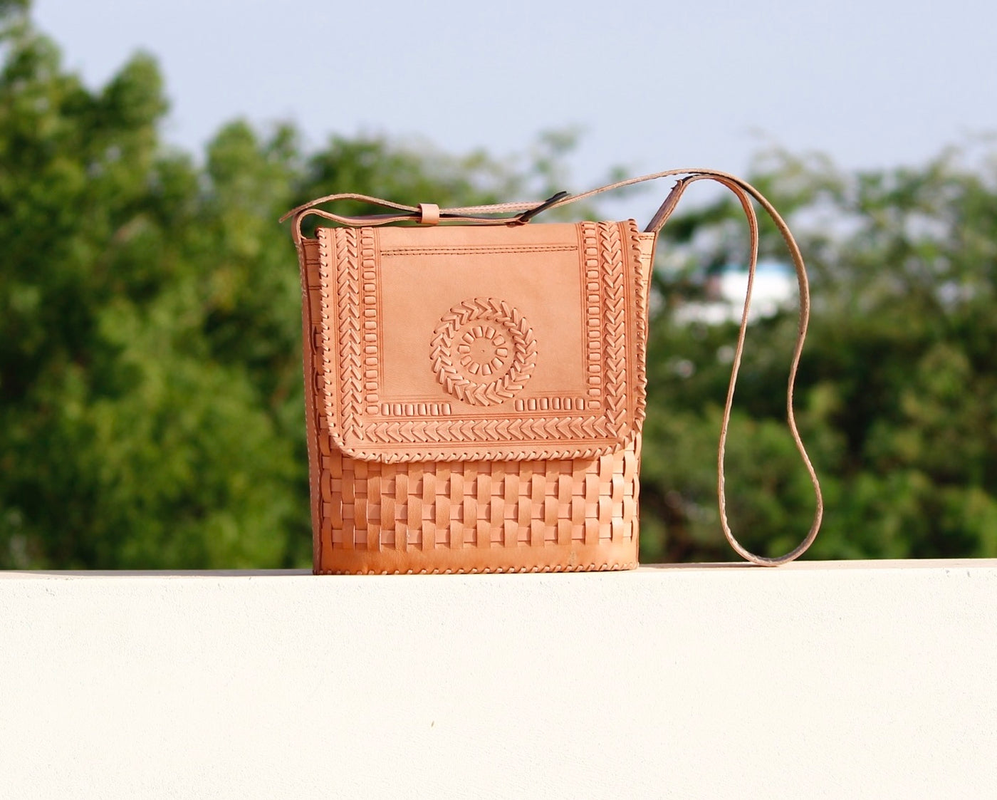 Handstitched leather bag crafted from premium leather with meticulous handmade detailing