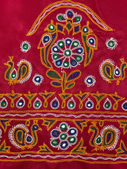 Elegant pink blouse piece adorned with beautiful Ahir embroidery motifs