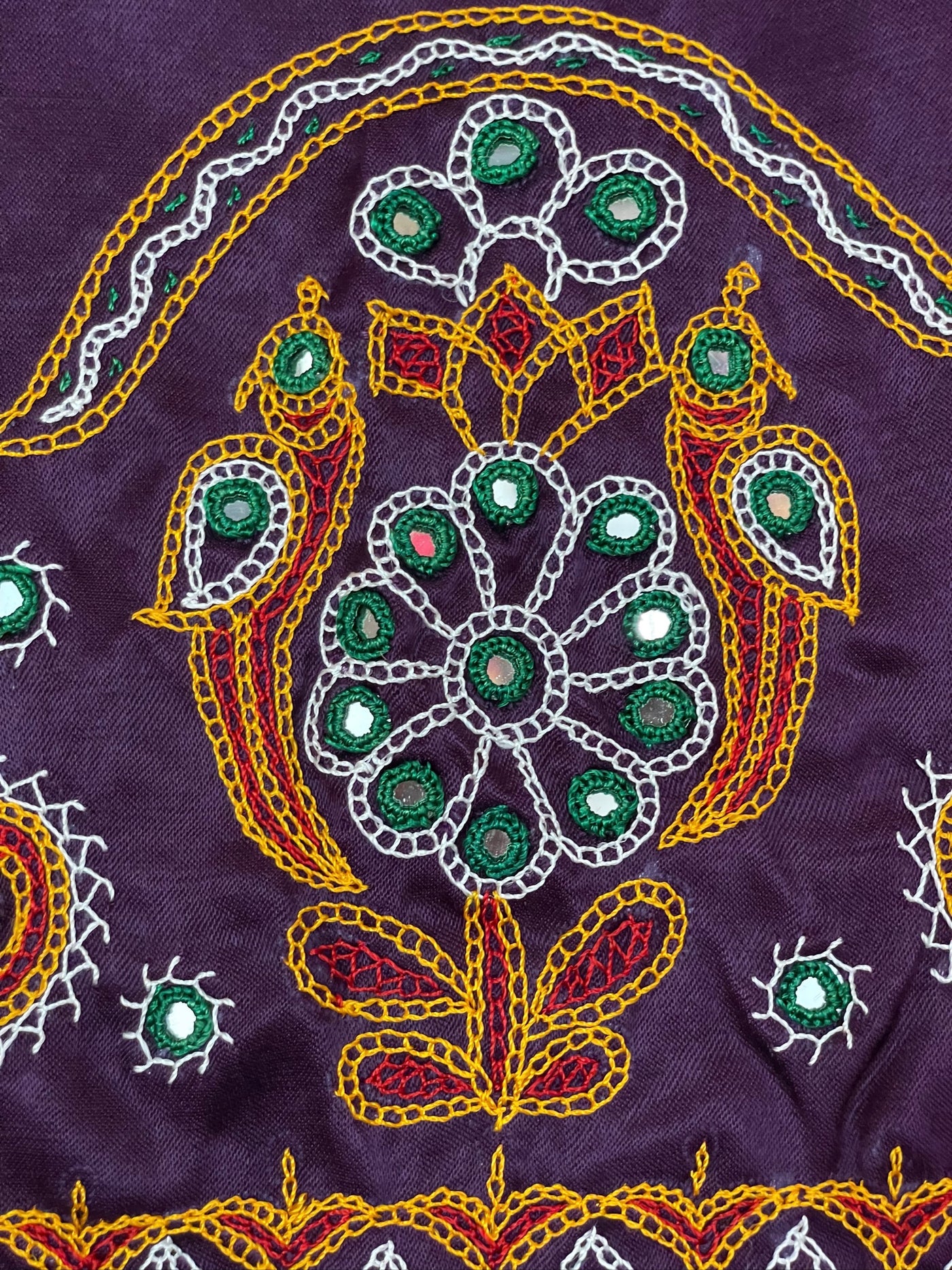 Elegant royal purple blouse piece adorned with beautiful Ahir embroidery motifs