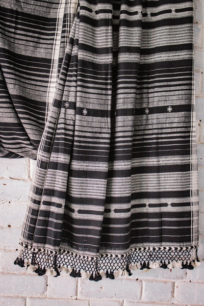 Charcoal Kala Cotton Bhujodi saree featuring traditional handwoven patterns and artisanal craftsmanship