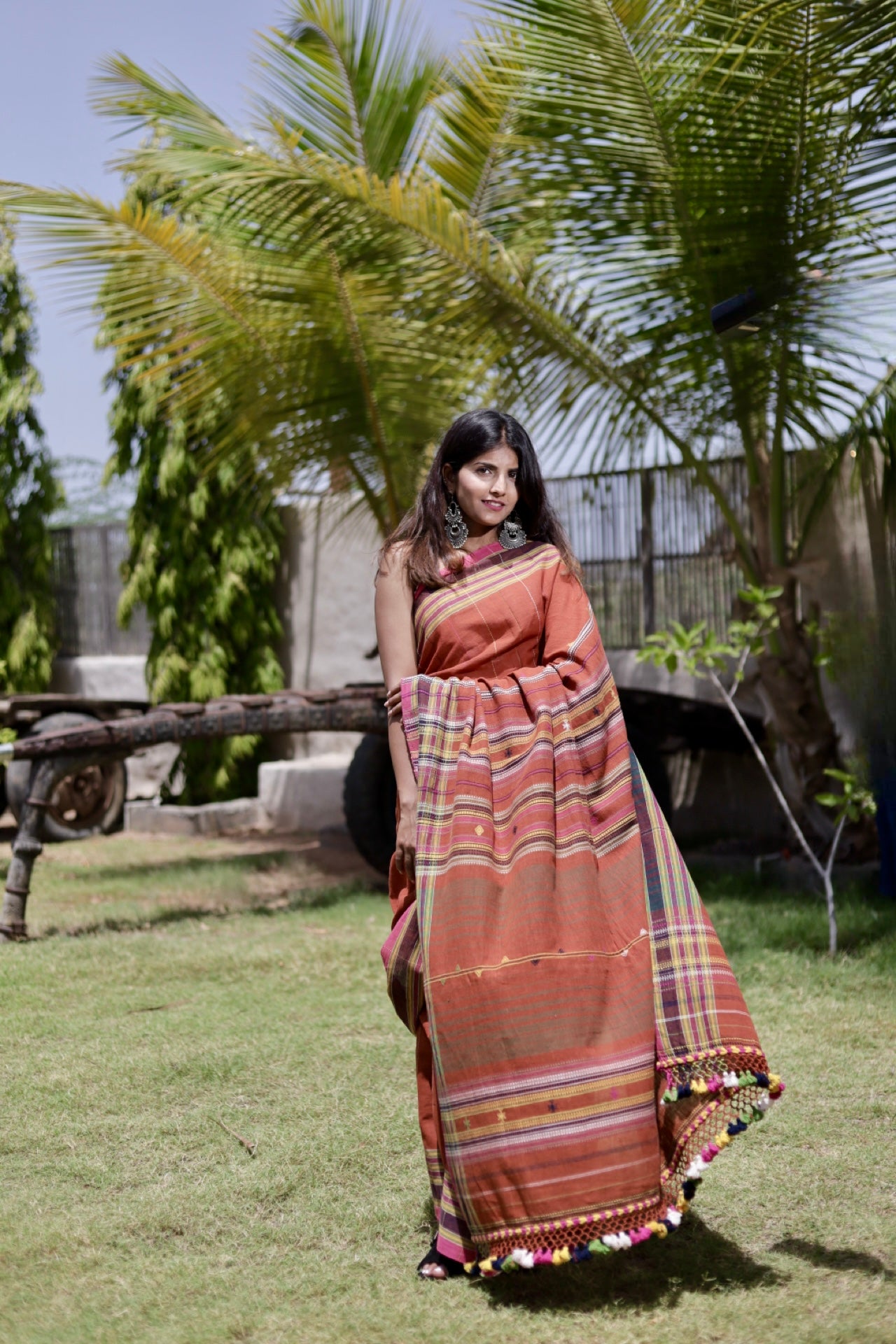 Handcrafted copper Kala Cotton saree adorned with authentic Bhujodi weaving and heritage-inspired motifs