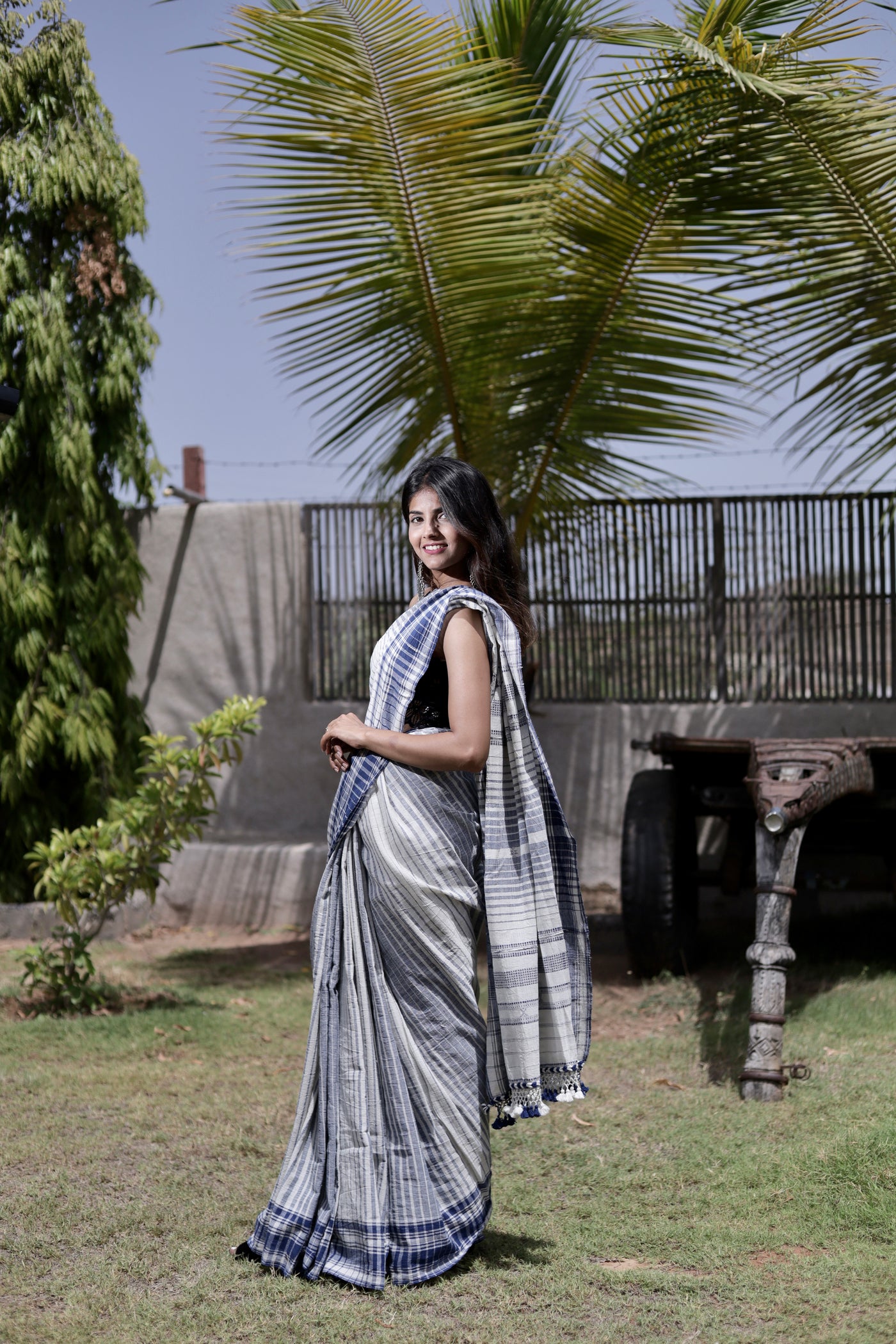 Handcrafted dusk Kala Cotton saree adorned with authentic Bhujodi weaving and heritage-inspired motifs
