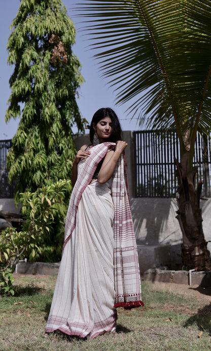 Handcrafted frost Kala Cotton saree adorned with authentic Bhujodi weaving and heritage-inspired motifs