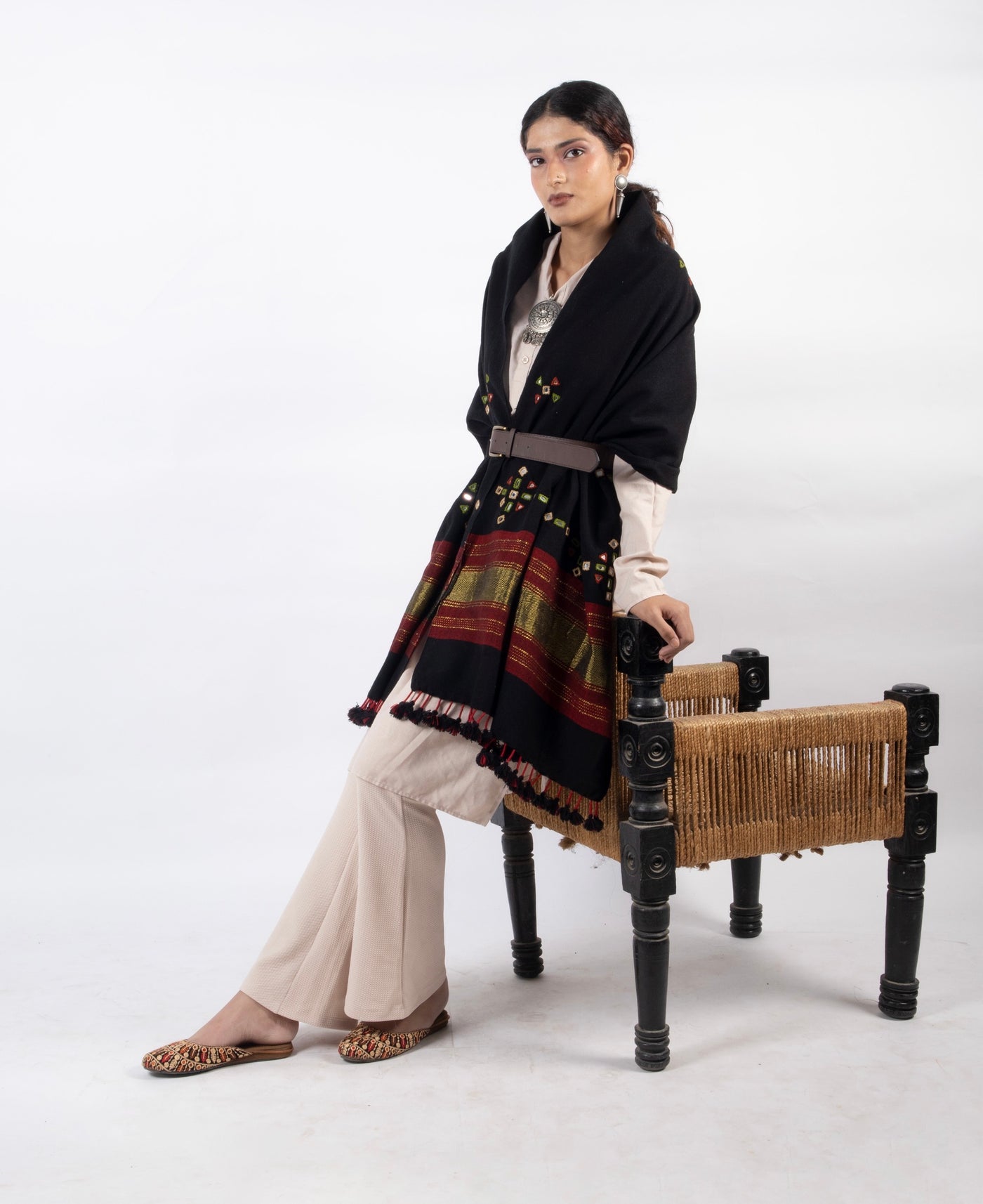 Classic handwoven woolen stole in classic black designed for warmth, comfort, and versatile styling