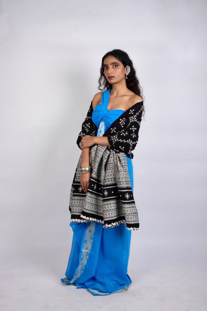 Classic handwoven woolen shawl in midnight black designed for warmth, comfort, and sophistication