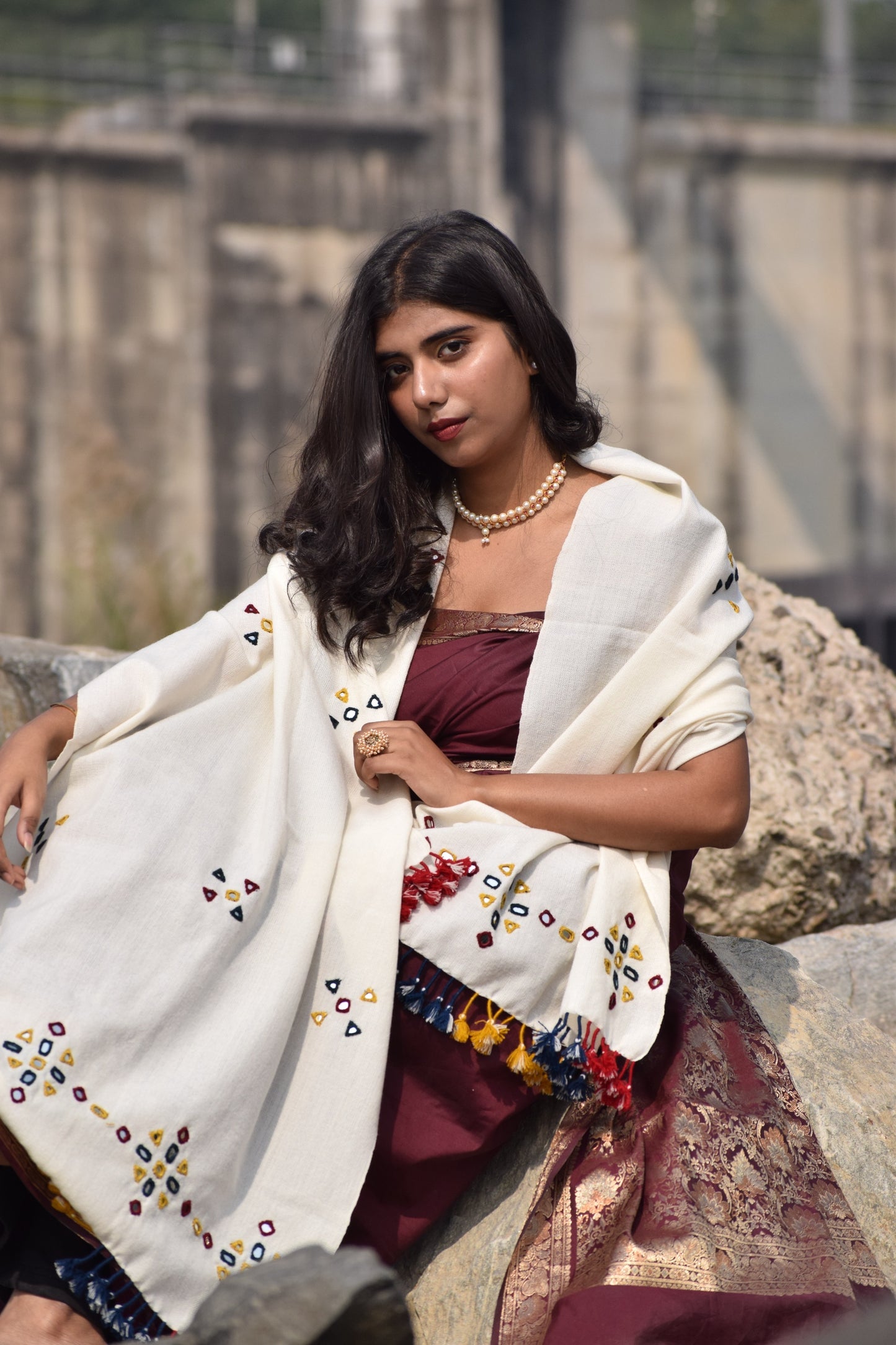 Classic handwoven woolen stole in pearl white designed for warmth, comfort, and versatile styling