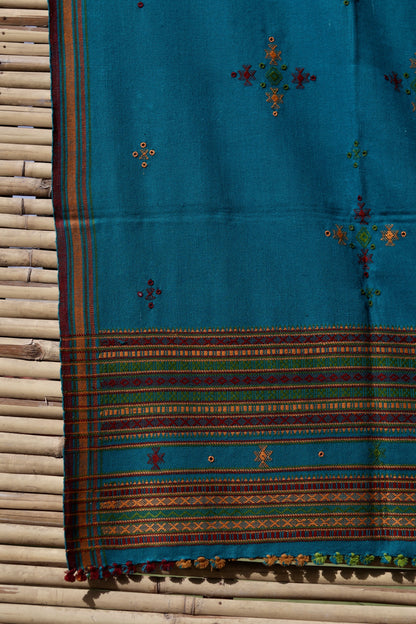 Classic handwoven woolen shawl in turquoise blue designed for warmth, comfort, and sophisticated styling