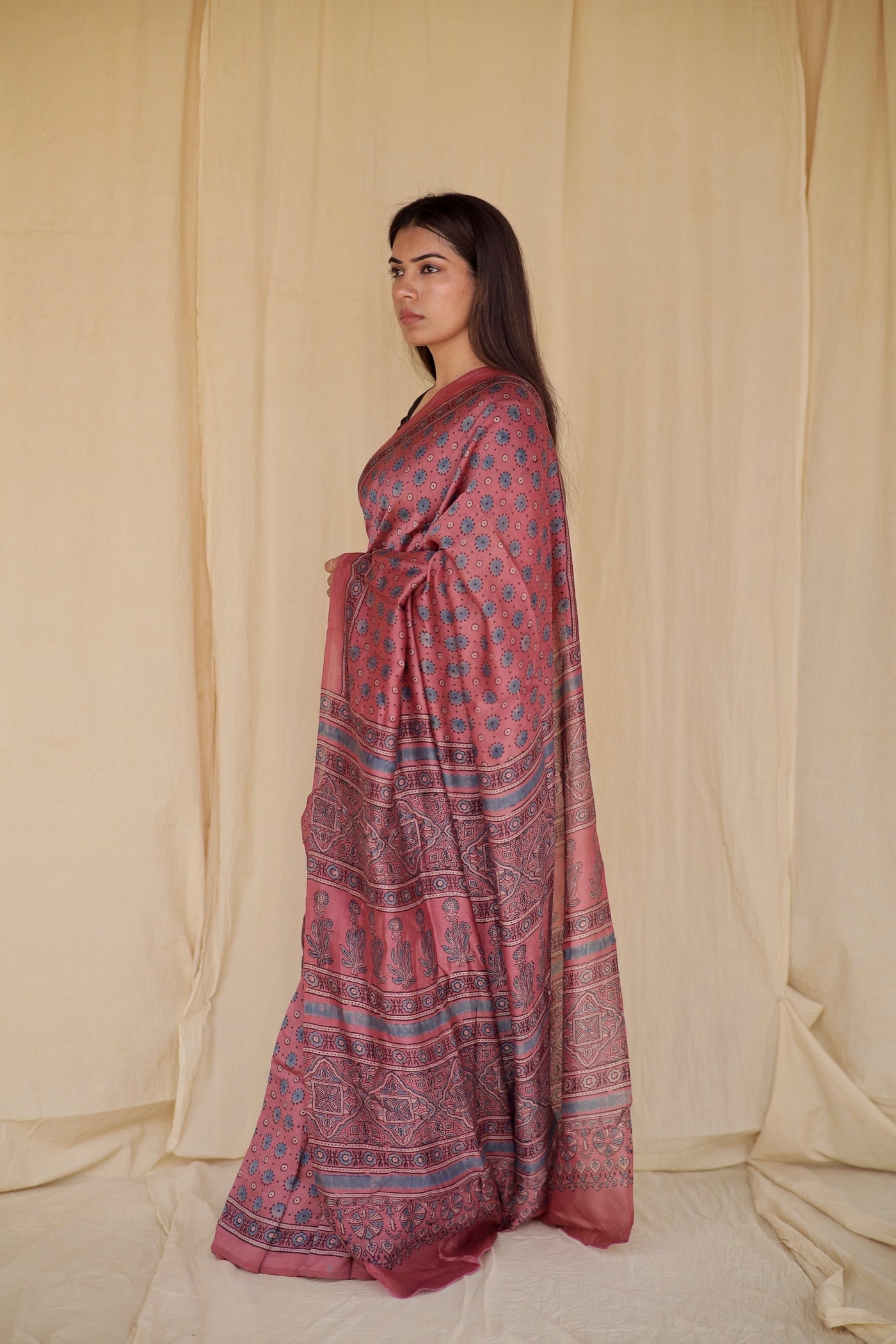 Handcrafted lavender pink Chanderi silk saree adorned with traditional Ajrakh patterns and delicate texture
