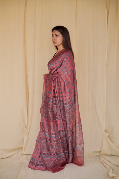 Handcrafted lavender pink Chanderi silk saree adorned with traditional Ajrakh patterns and delicate texture