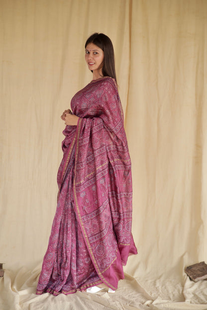 Handcrafted light magenta Chanderi silk saree adorned with traditional Ajrakh patterns and delicate texture