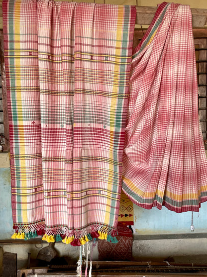Handcrafted light rose Kala Cotton saree adorned with authentic Bhujodi weaving and heritage-inspired motifs