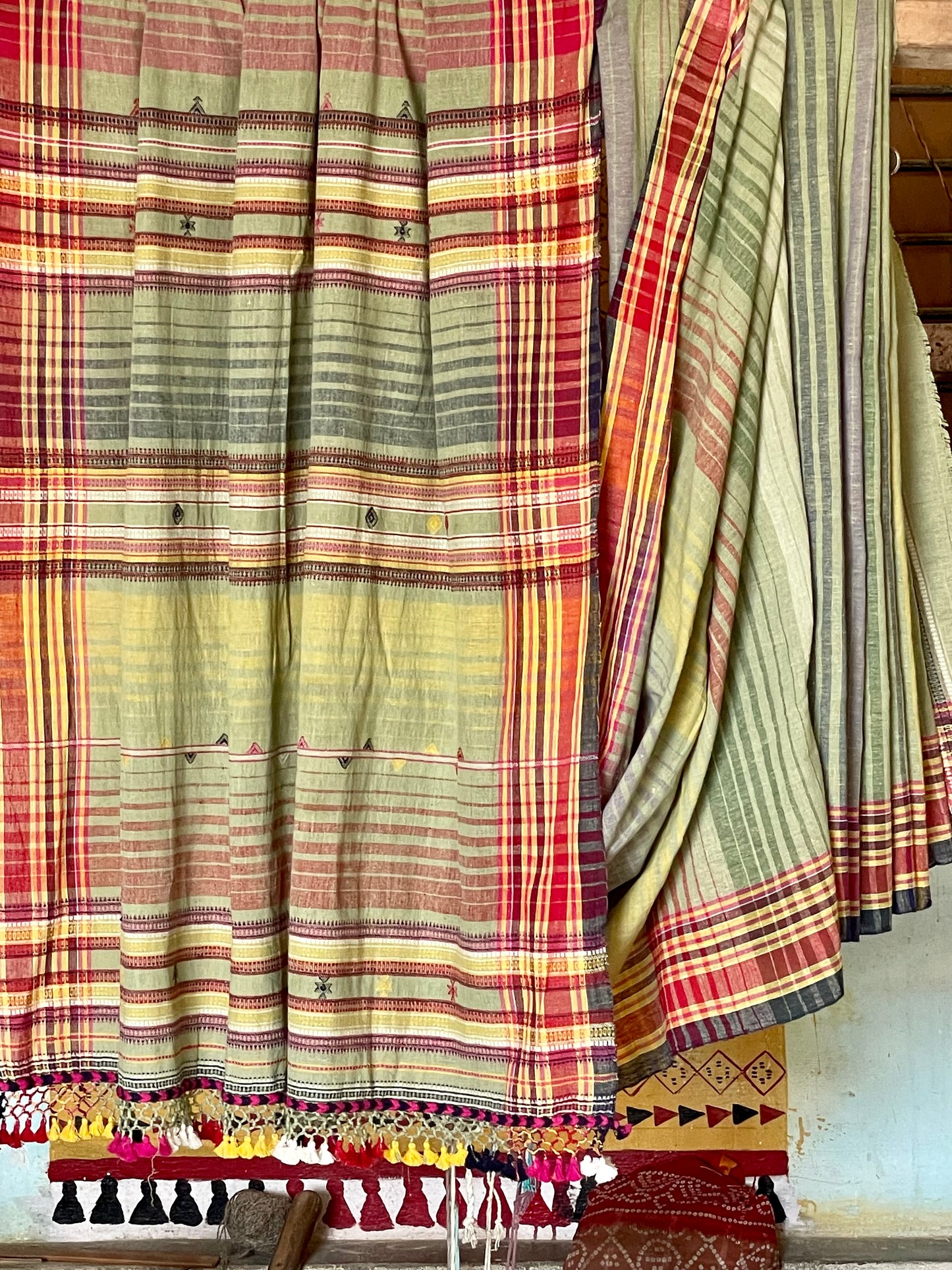 Handcrafted meadow Kala Cotton saree adorned with authentic Bhujodi weaving and heritage-inspired motifs