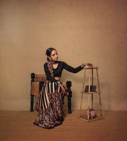 Handcrafted midnight black modal silk saree with traditional Ajrakh patterns and luxurious texture
