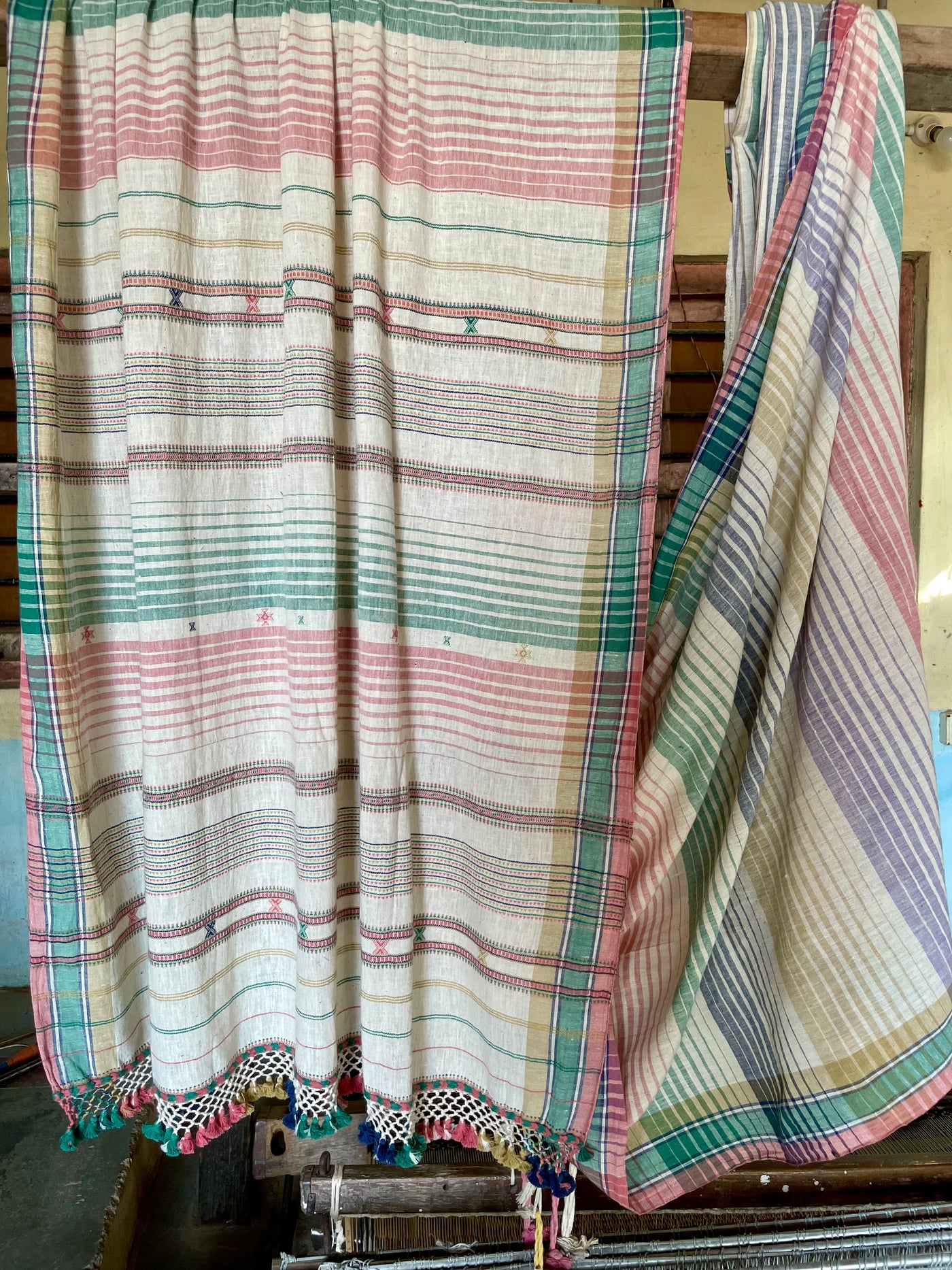Handcrafted mint Kala Cotton saree adorned with authentic Bhujodi weaving and heritage-inspired motifs