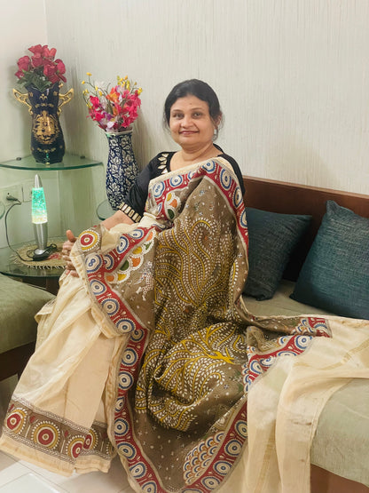 Handcrafted olive branch Mata Ni Pachedi saree adorned with authentic handpainted designs inspired by Gujarat's folk art heritage