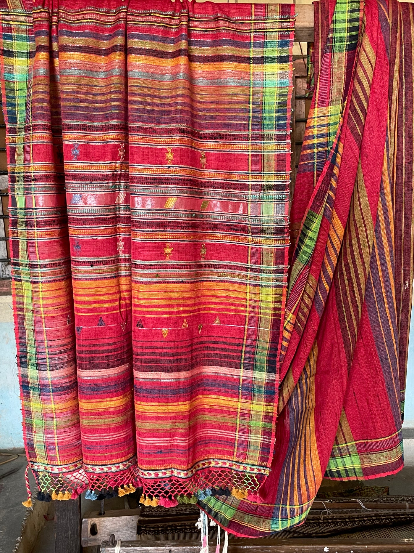 Handcrafted paprika Kala Cotton saree adorned with authentic Bhujodi weaving and heritage-inspired motifs