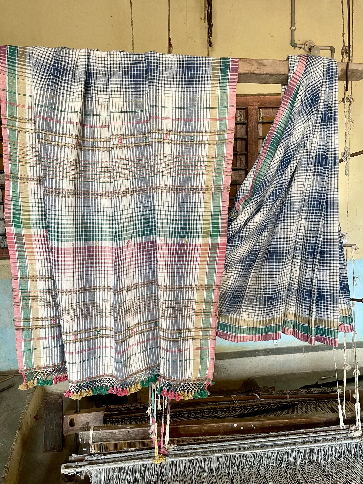 Handcrafted pebble Kala Cotton saree adorned with authentic Bhujodi weaving and heritage-inspired motifs