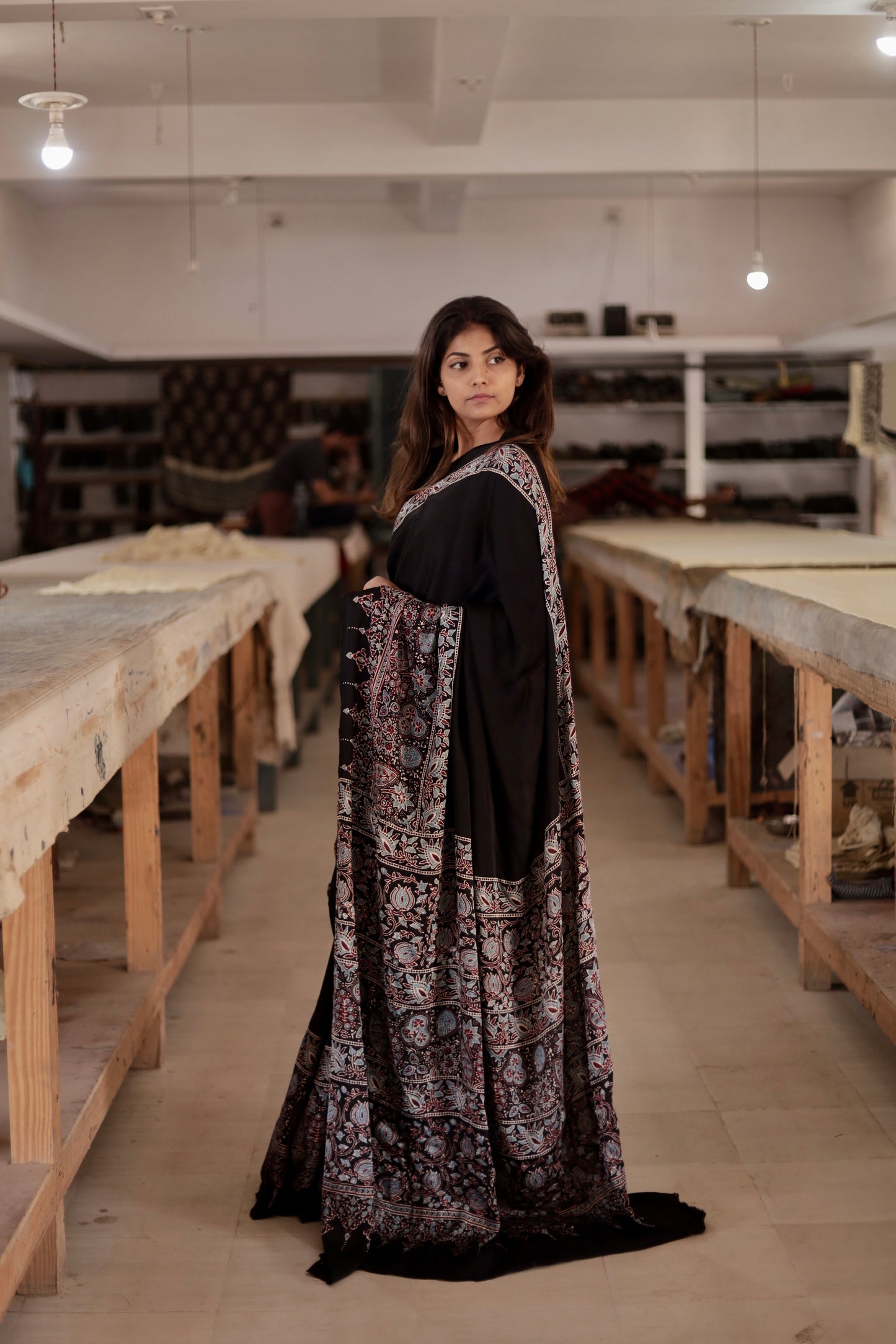 Elegant plain black Ajrakh modal silk saree with a soft texture and graceful flow