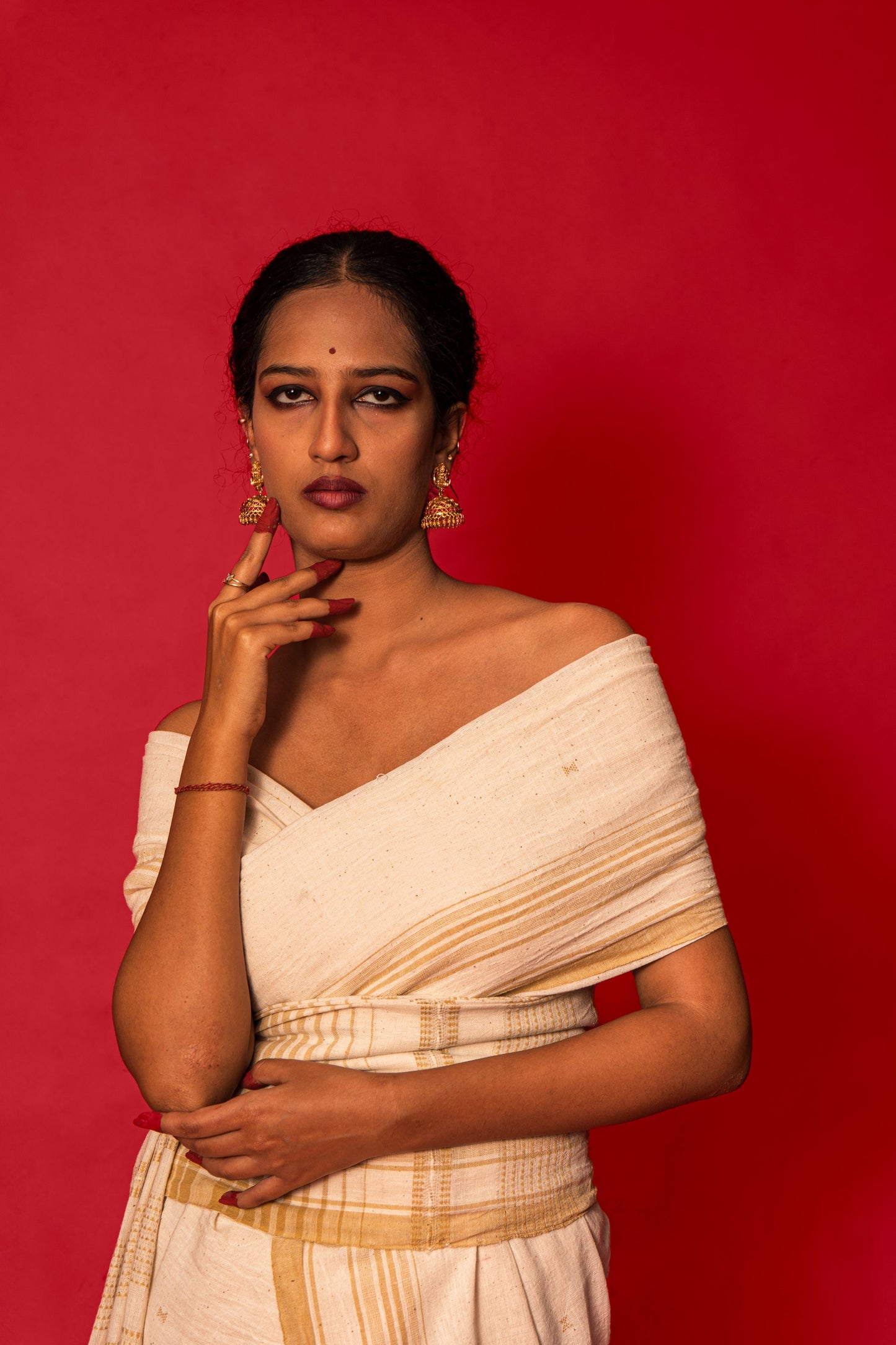 Handcrafted shell Kala Cotton saree adorned with authentic Bhujodi weaving and heritage-inspired motifs