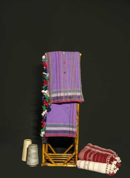 Handcrafted violet Kala Cotton saree adorned with authentic Bhujodi weaving and heritage-inspired motifs