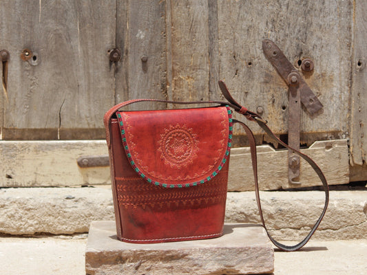 Leather bag with thread work