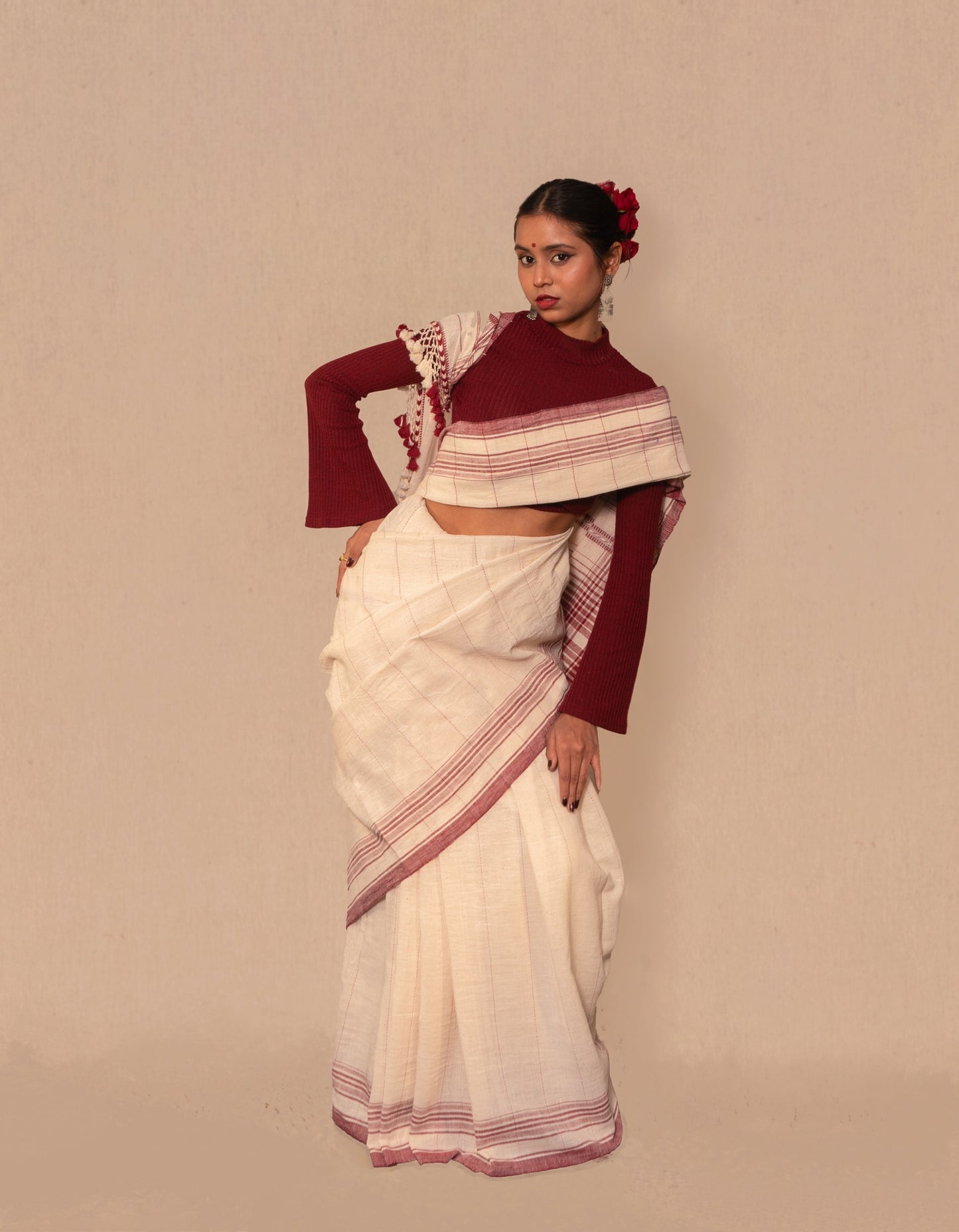 Ivory Kala Cotton Bhujodi saree featuring traditional handwoven patterns and artisanal craftsmanship