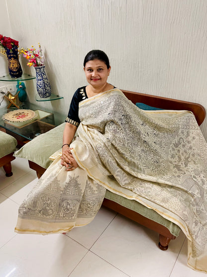 Ivory white handpainted Mata Ni Pachedi saree featuring traditional sacred motifs and intricate artisan detailing