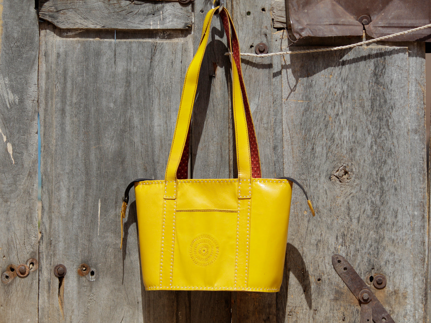 Handmade leather shoulder bag showcasing fine craftsmanship and durable construction