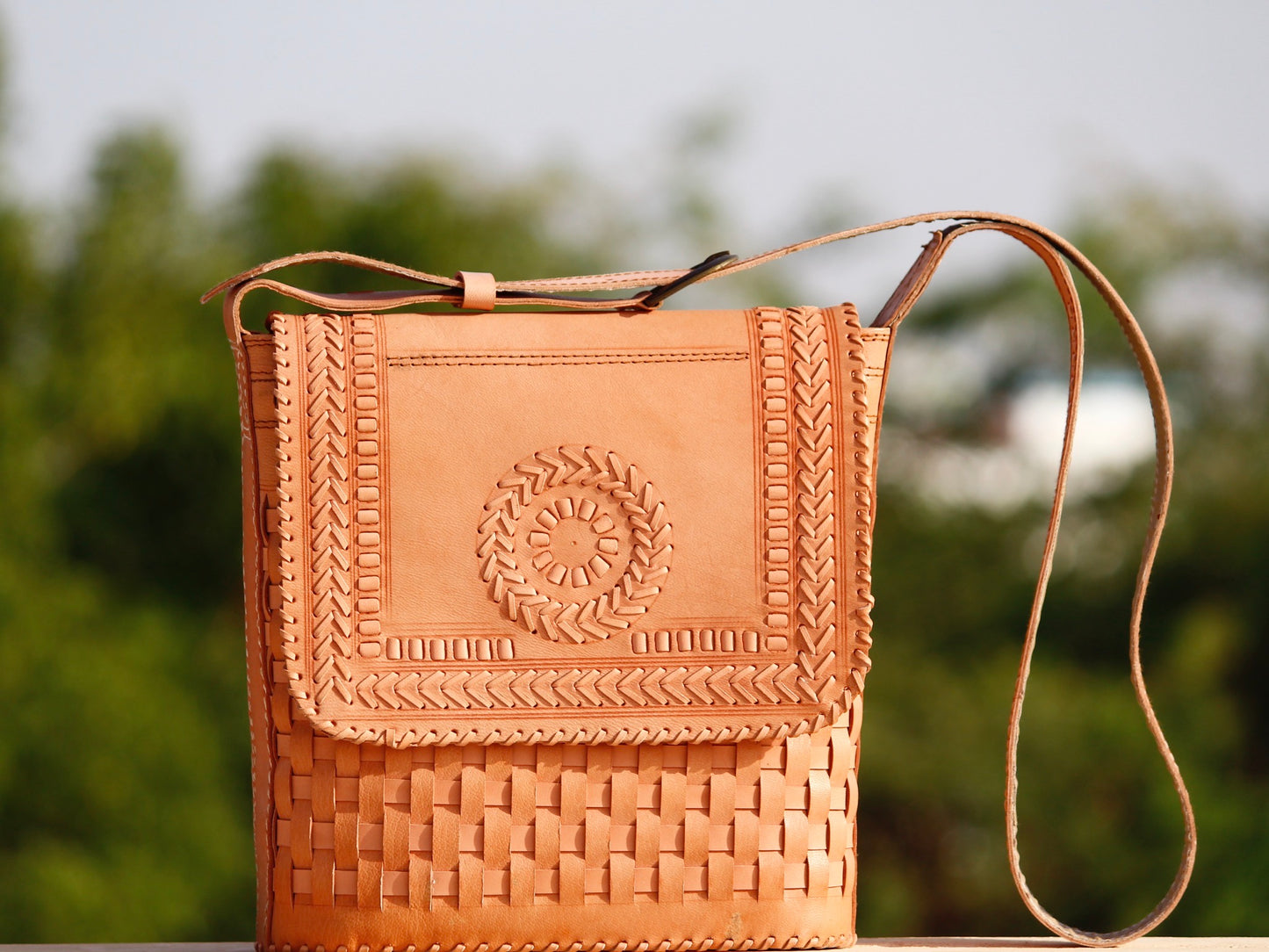 Handstitched leather bag crafted from premium leather with meticulous handmade detailing