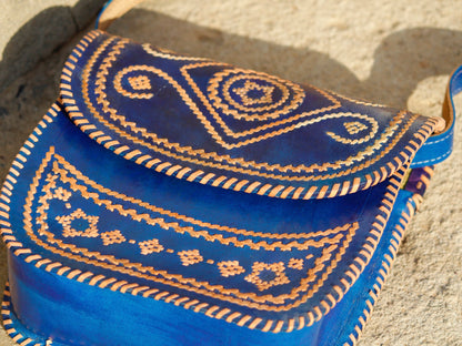 Elegant leather bag with embroidered accents and durable leather construction