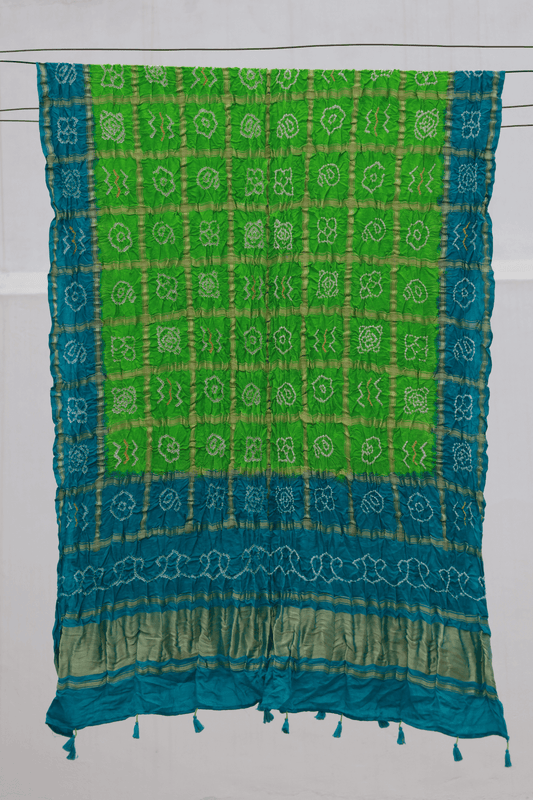 Lime green Bandhani Gharchola dupatta featuring traditional tie-dye craftsmanship and classic Gharchola patterns