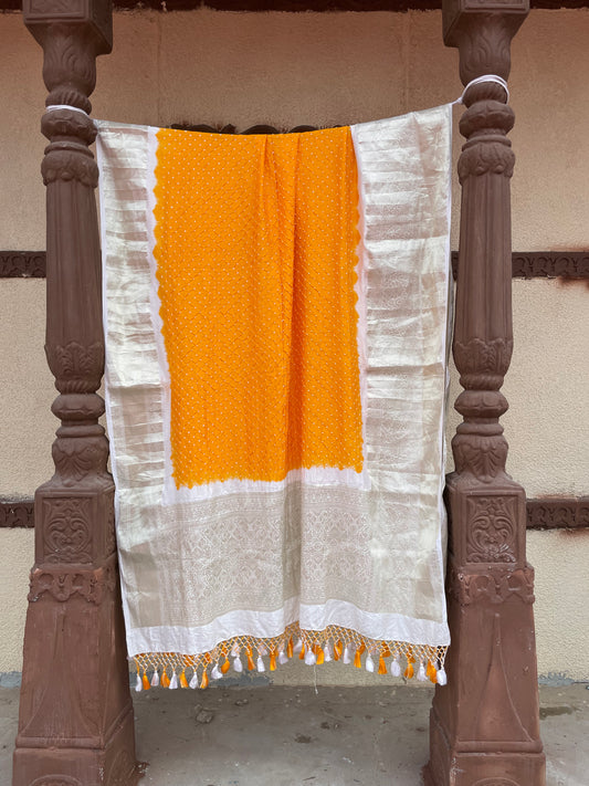 Marigold yellow Kanjivaram silk Bandhani dupatta featuring traditional tie-dye craftsmanship and luxurious silk texture