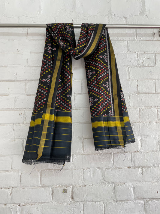 Midnight black Patola Single Ikkat dupatta featuring intricate woven motifs and traditional artisan craftsmanship