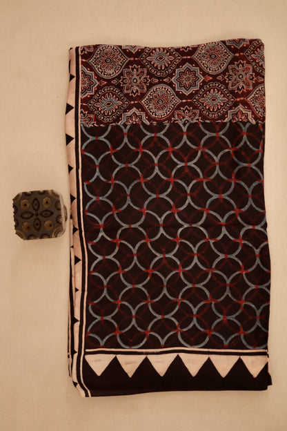 Mocha brown Ajrakh modal silk dupatta featuring intricate hand block printed motifs and elegant drape