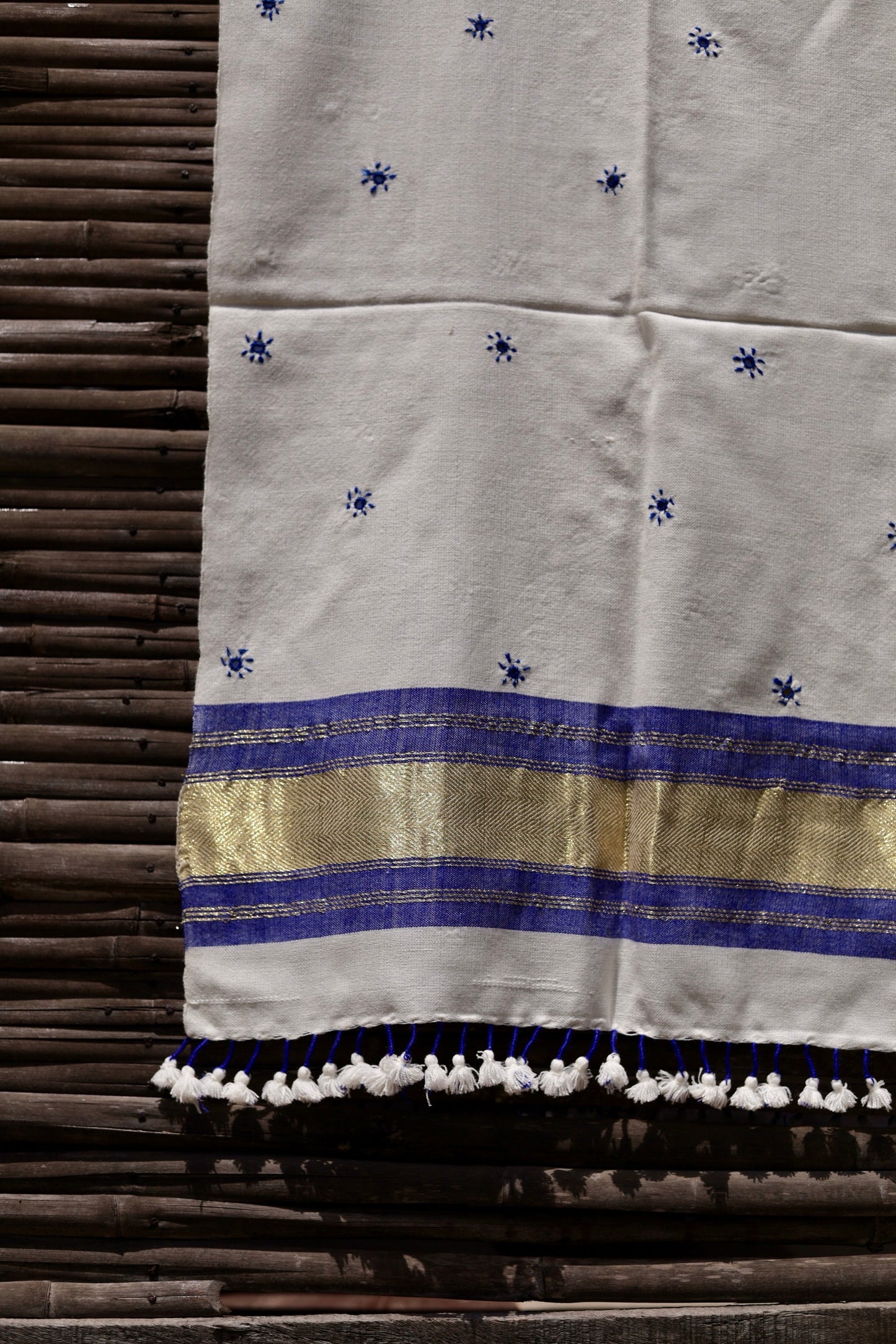 Moonstone white handwoven woolen stole featuring a luminous tone and fine artisan craftsmanship