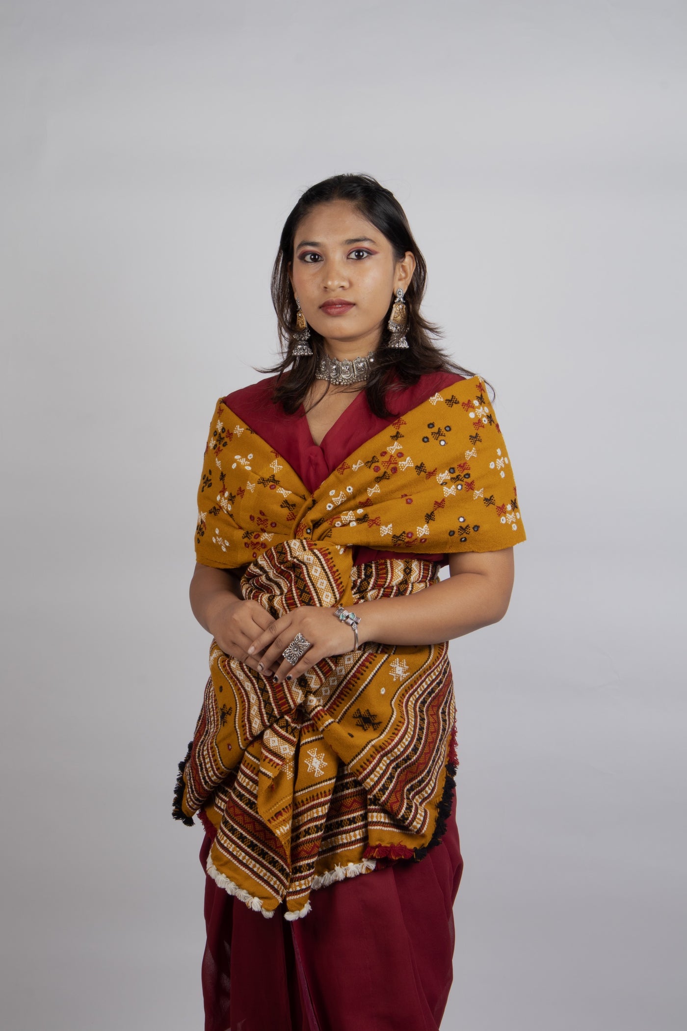 Mustard gold handwoven woolen shawl featuring a warm golden hue and exquisite artisan craftsmanship