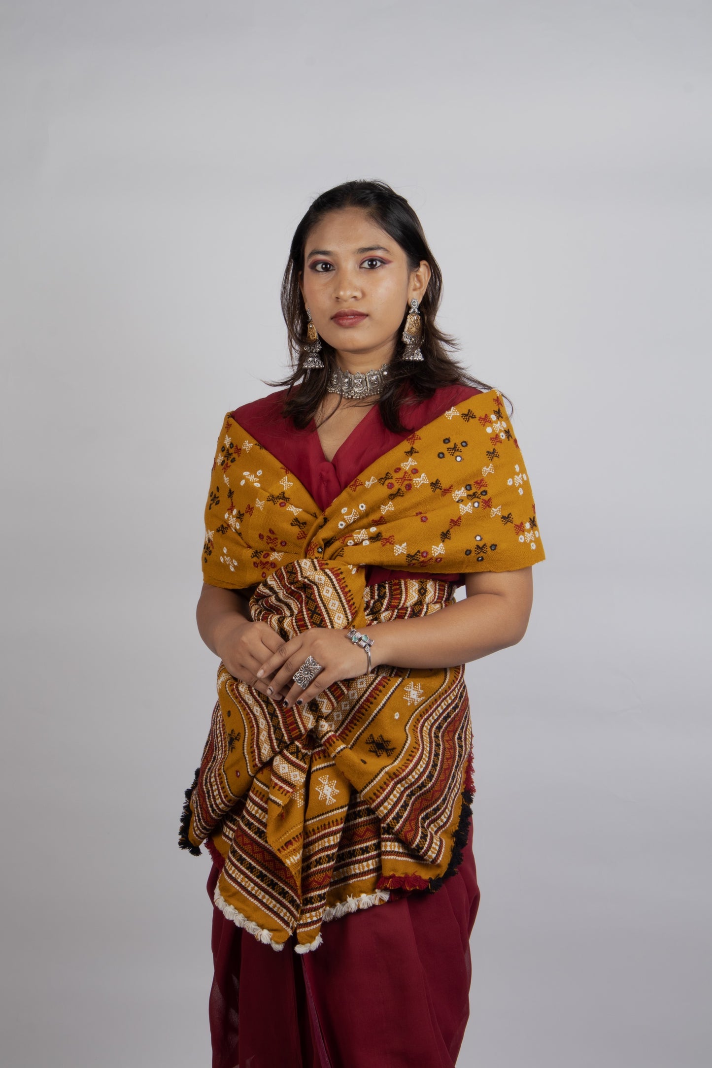 Mustard gold handwoven woolen shawl featuring a warm golden hue and exquisite artisan craftsmanship