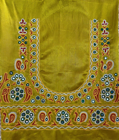 Mustard yellow Ahir embroidery blouse piece showcasing intricate handcrafted embroidery details