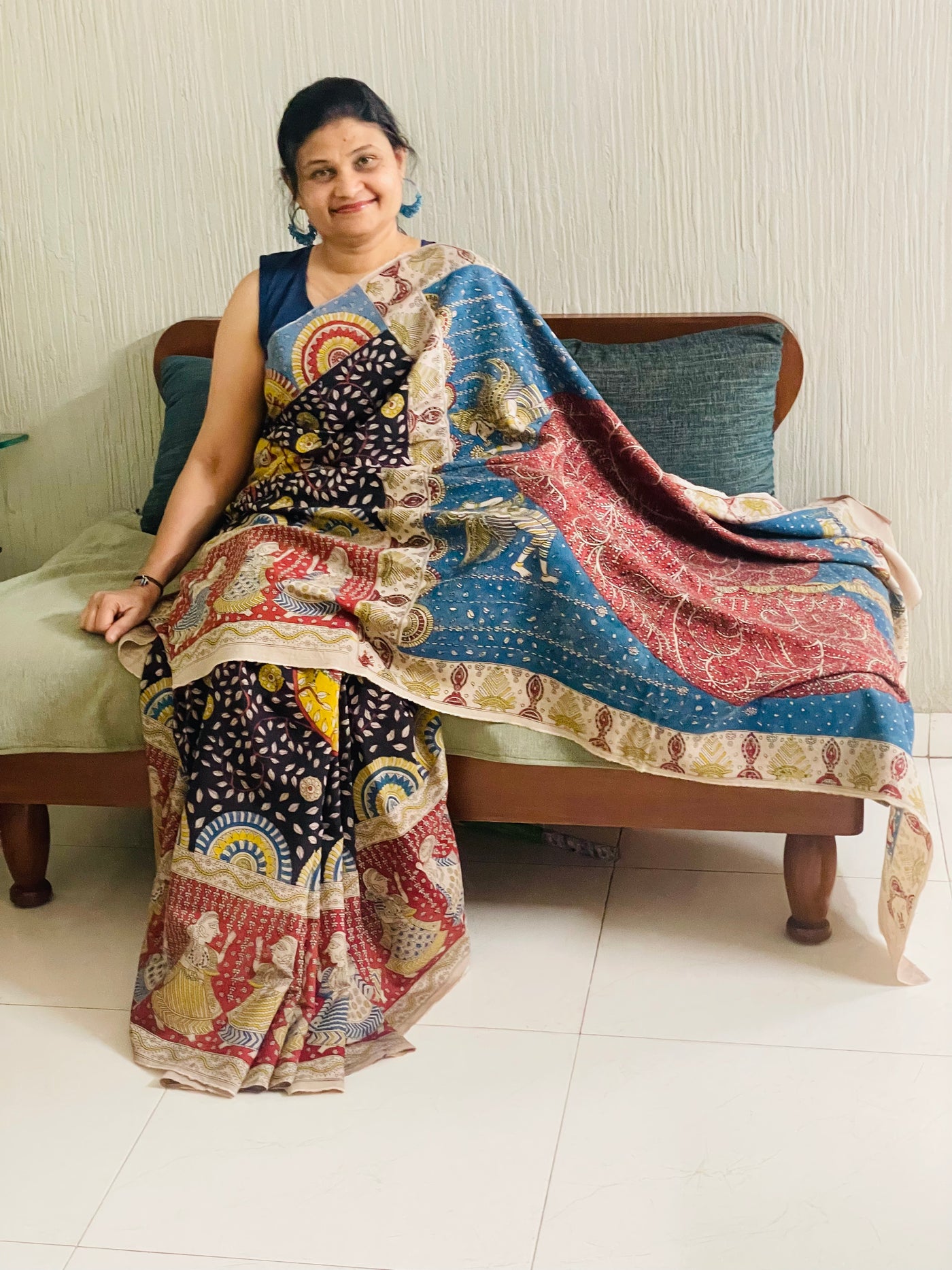 Ocean handpainted Mata Ni Pachedi saree featuring traditional sacred motifs and intricate artisan detailing