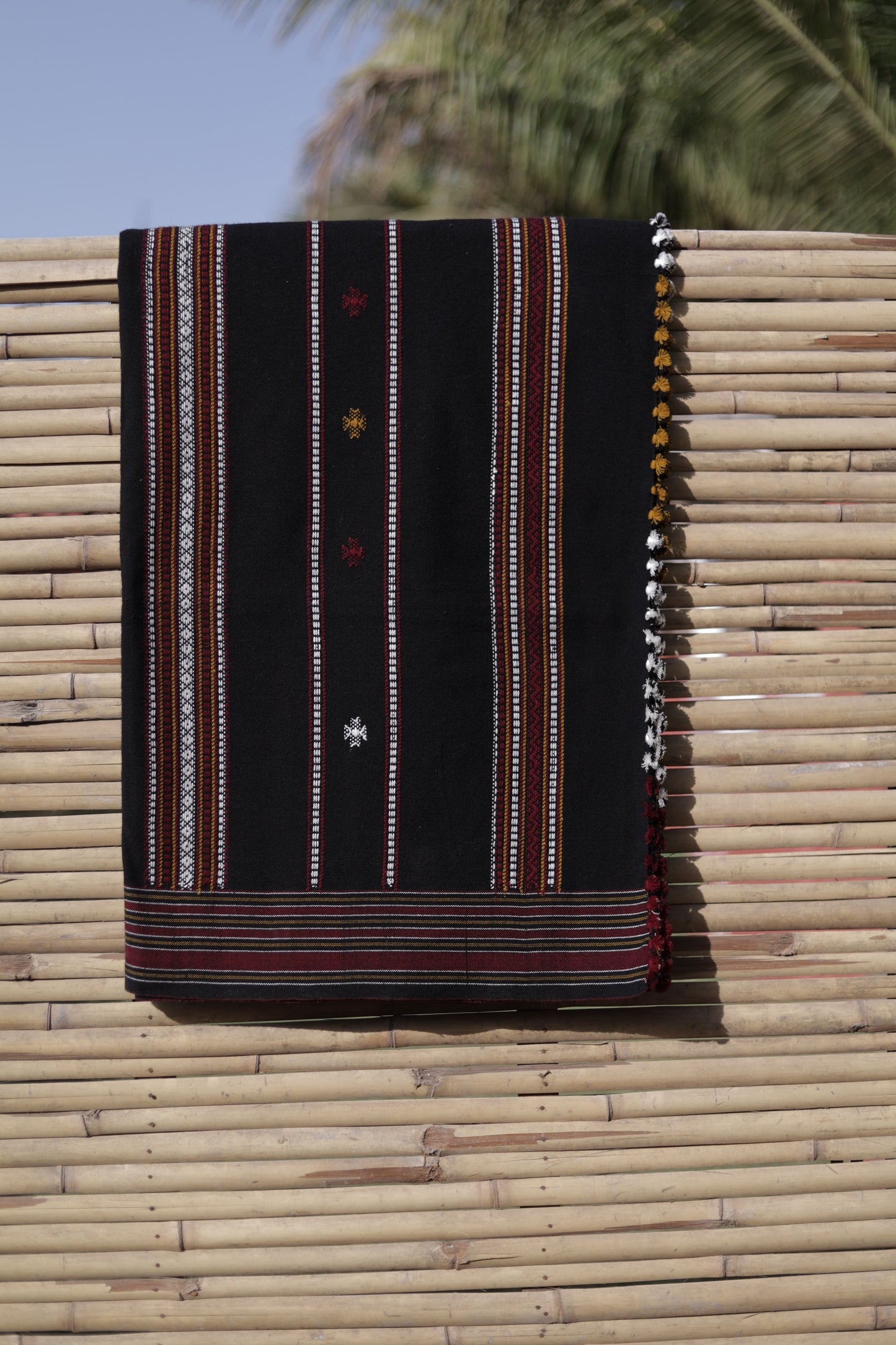 Onyx black handwoven woolen shawl featuring a deep black tone and refined artisan craftsmanship