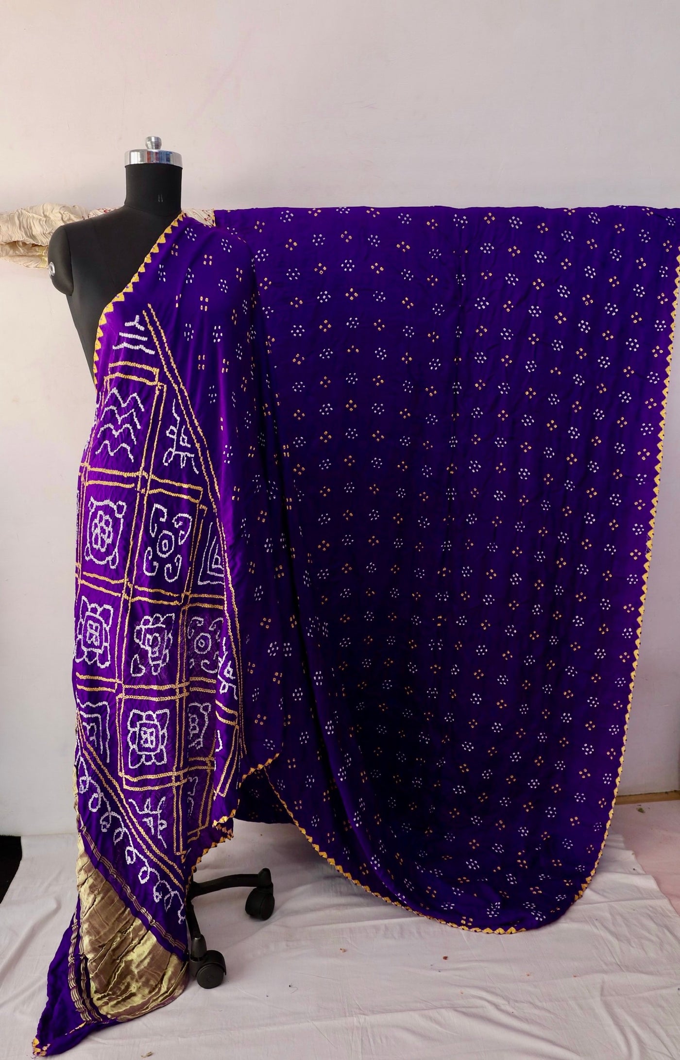 Orchid Bandhani Gajji silk saree featuring intricate tie-dye patterns and an elegant zari pallu