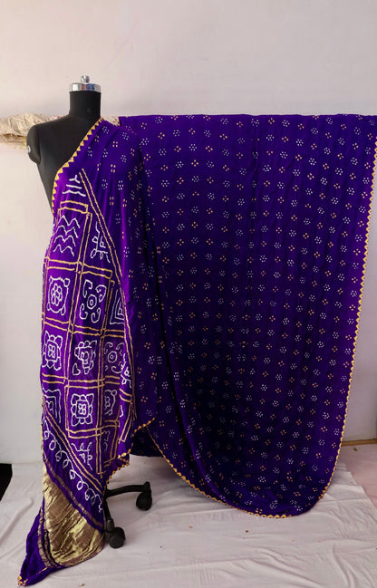 Orchid Bandhani Gajji silk saree featuring intricate tie-dye patterns and an elegant zari pallu
