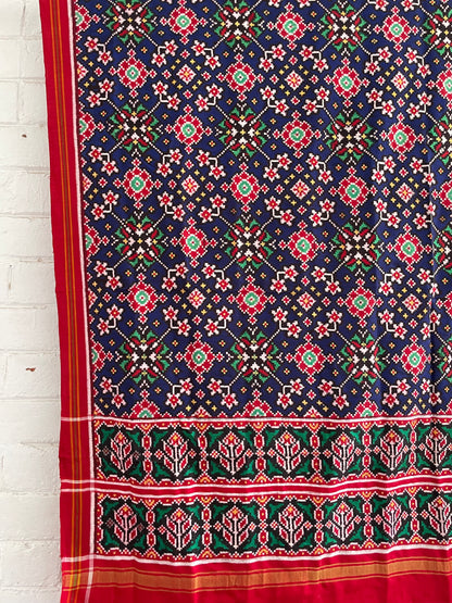 Patola Double Ikat silk dupatta featuring intricate geometric patterns and traditional handwoven craftsmanship