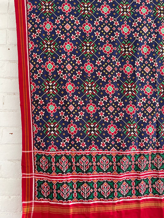 Patola Double Ikat silk dupatta featuring intricate geometric patterns and traditional handwoven craftsmanship