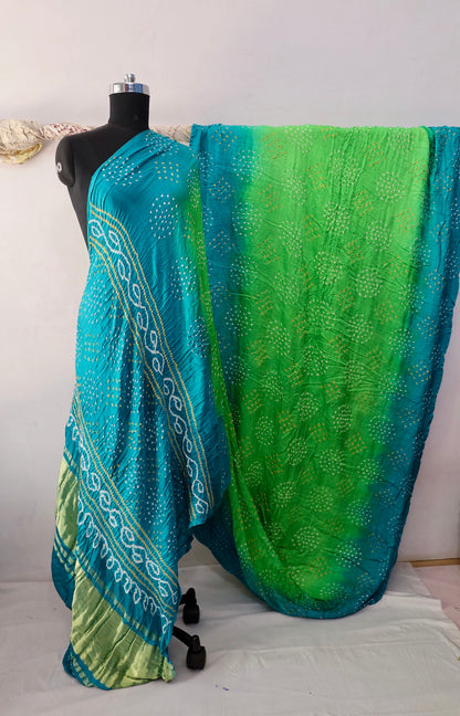 Peacock Bandhani Gajji silk saree featuring intricate tie-dye patterns and an elegant zari pallu