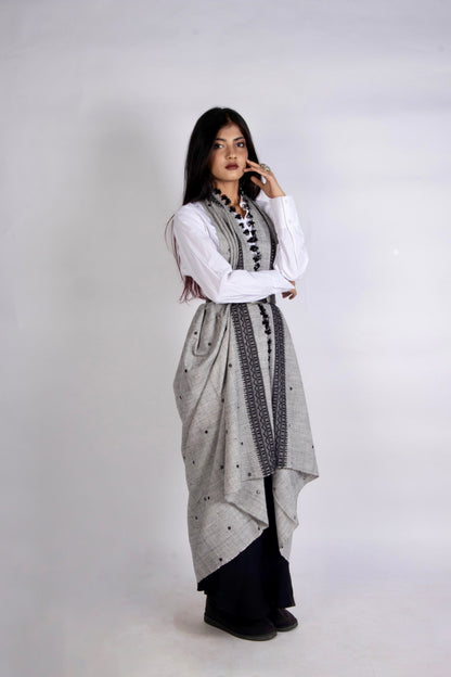 Pearl grey handwoven woolen shawl featuring a soft texture and elegant artisan craftsmanship